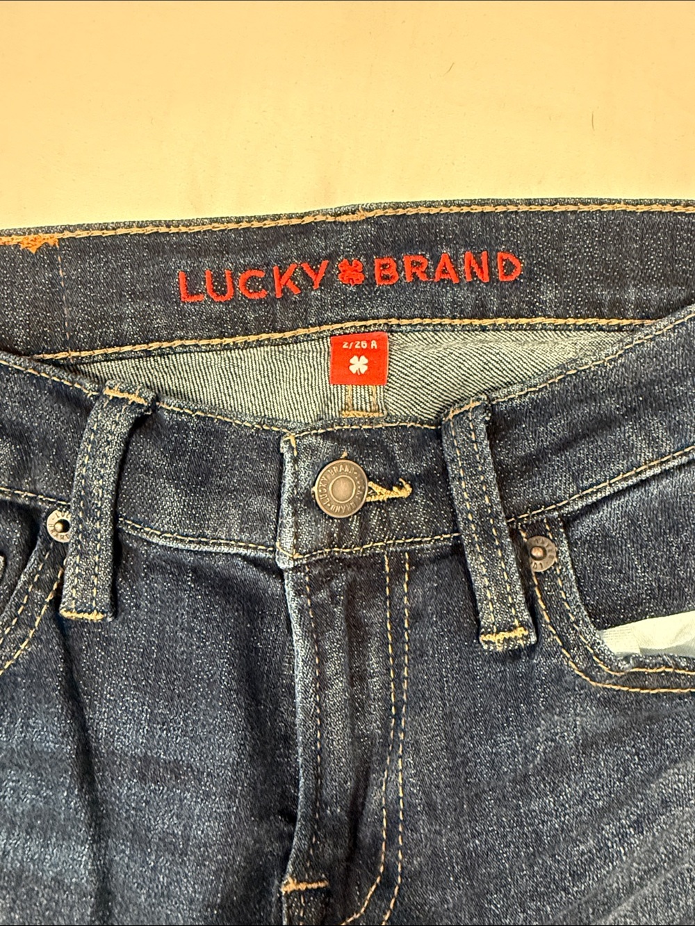 Lucky Brand Dark Blue Jeans with Red Logo